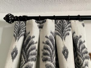 close up of pinch pleat drapery header on matte black rod in Rocky River OH