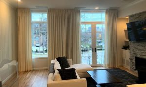 french door entryway with ceiling height white drapery in Cleveland OH