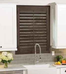 dark kitchen wood shutters behind sink in Cleveland, OH