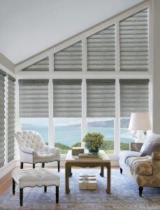 gray roman shades on angled window in Cleveland