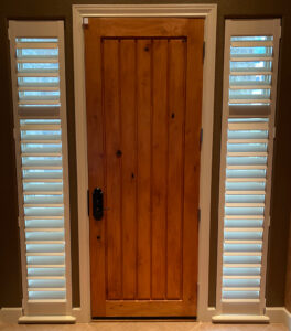 white shutters on narrow front windows
