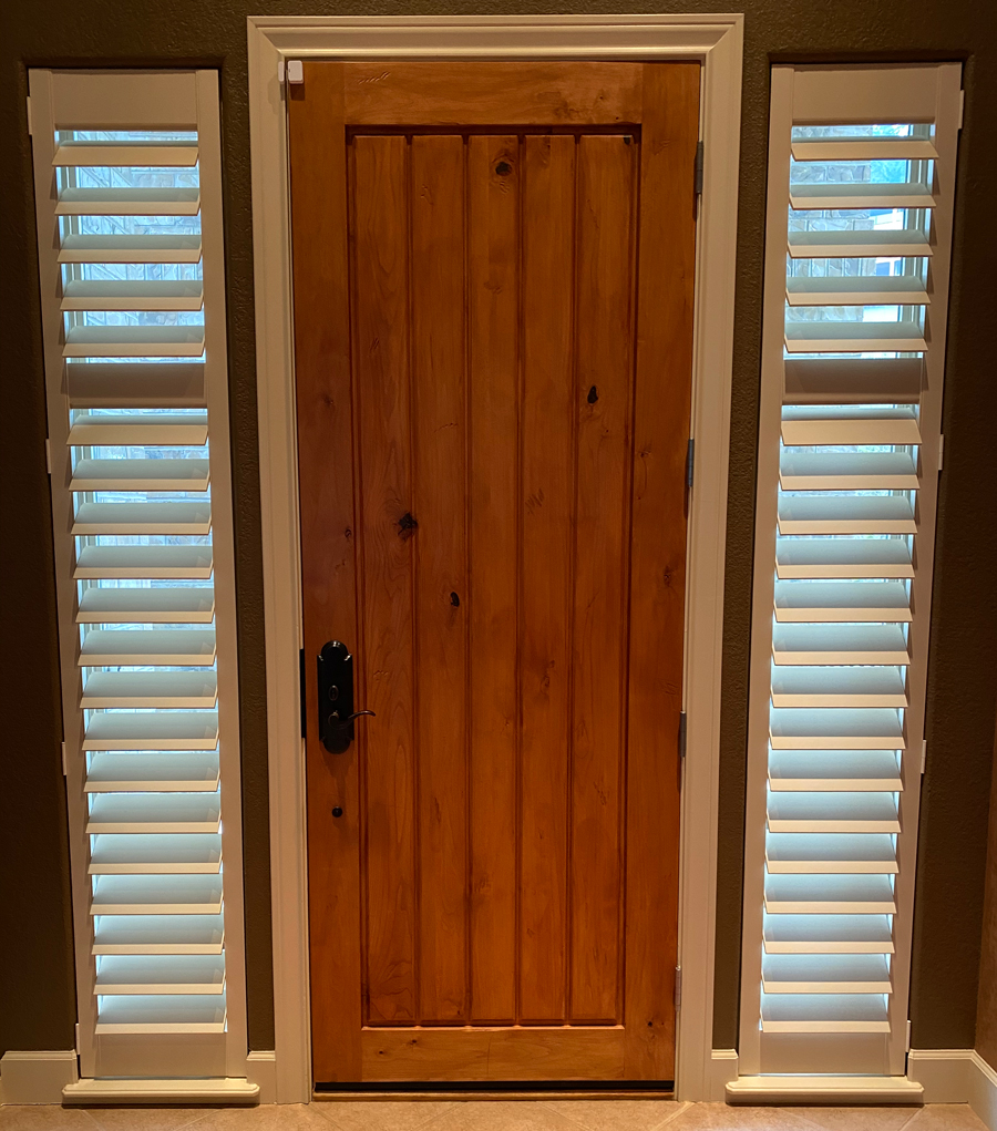 white shutters on narrow front windows 