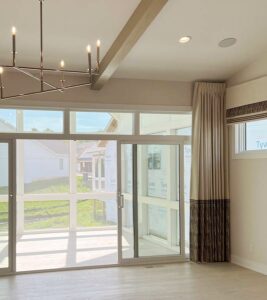 floor to ceiling custom drapery panels in new home build