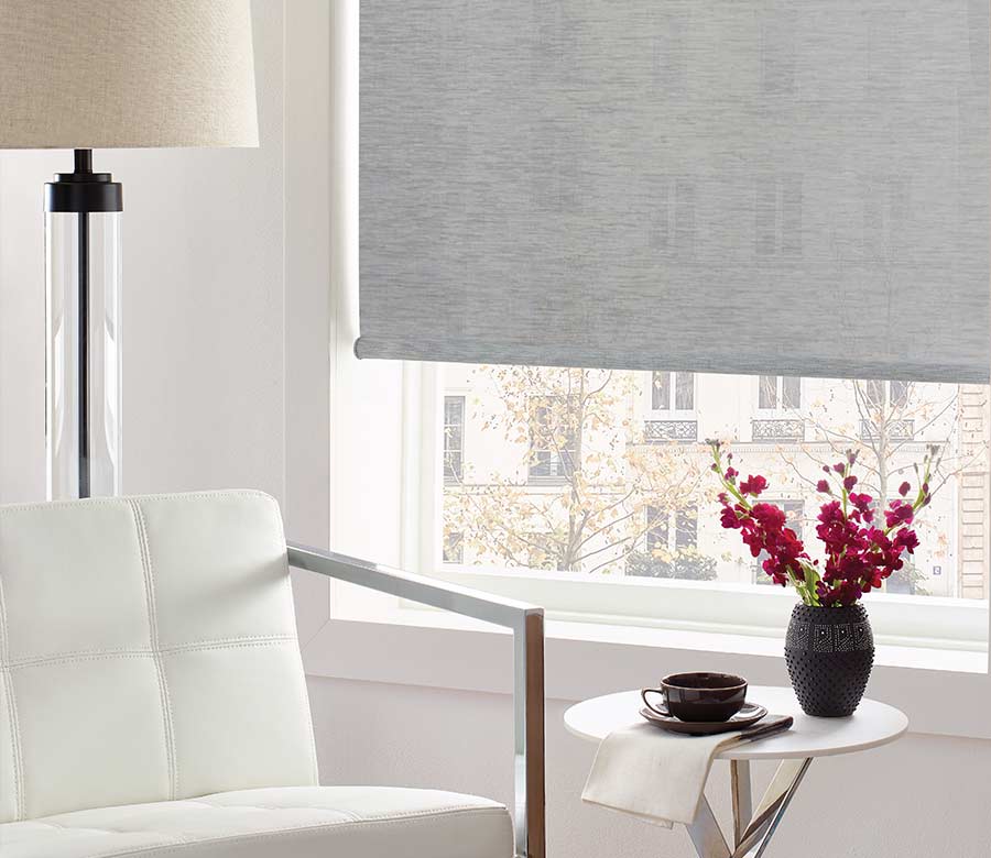 white leather chair next to window with view, gray designer shade in Cuyahoga County Ohio