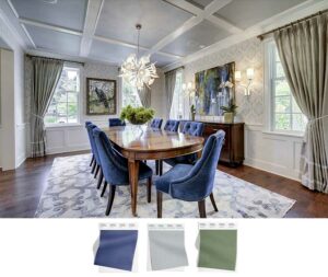 A beautiful, neutral dining room that has blue chairs, green curtains and a gray ceiling. They pair together to establish an elegant look