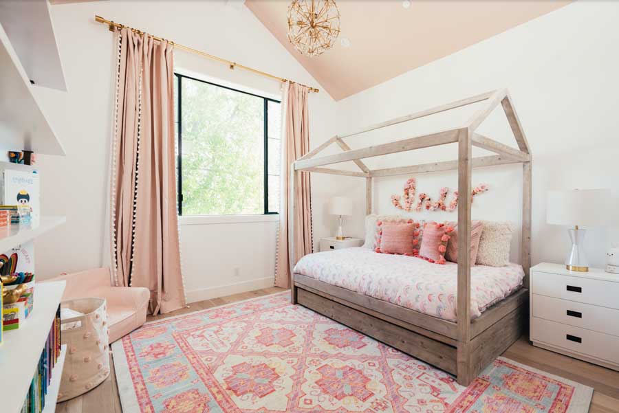 pink patterned girl's bedroom