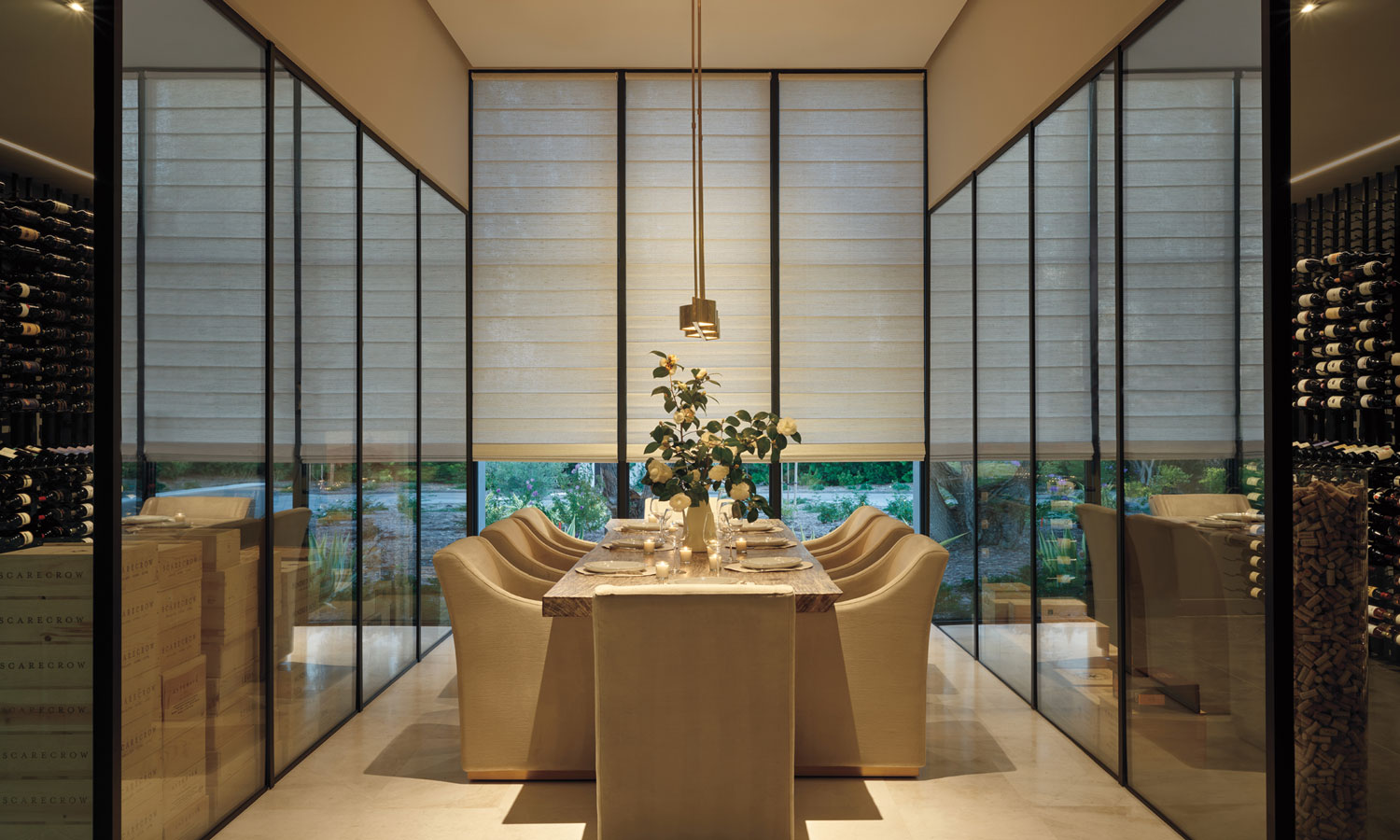 Elegant dining room in evening light featuring Alustra Woven Texture Roman Shades