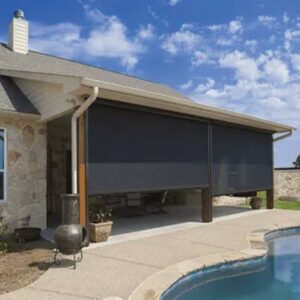 black exterior roller shades near pool