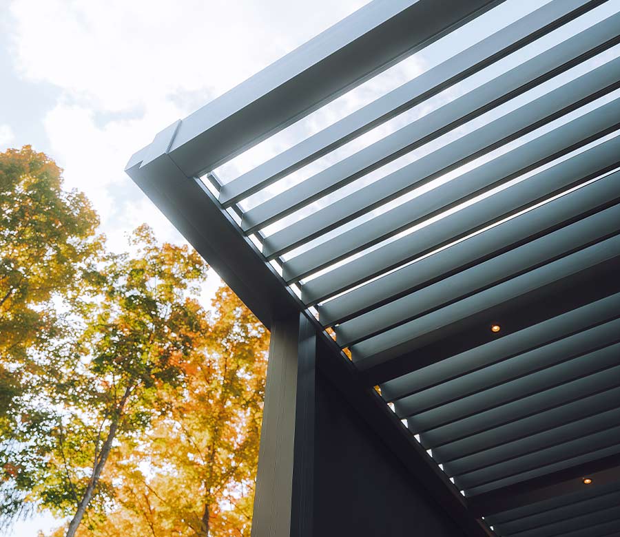 black pergola open louvers in fall