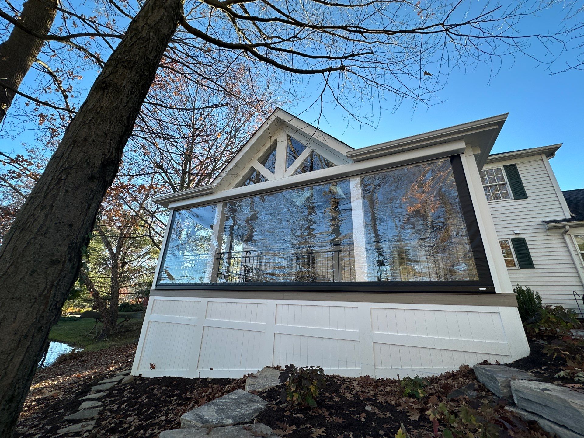 clear exterior window treatments on back porch