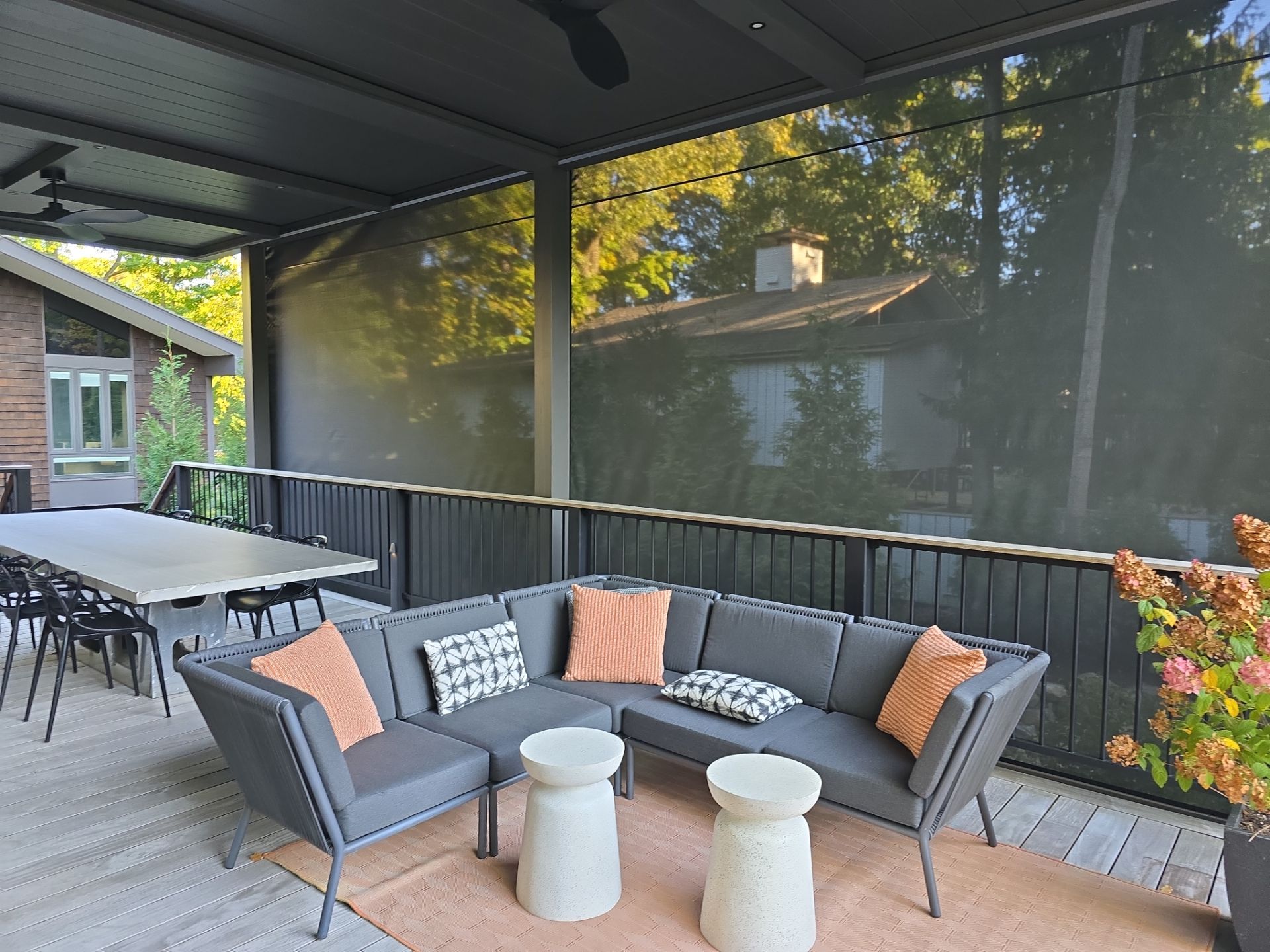 outdoor patio with black screens on large back patio