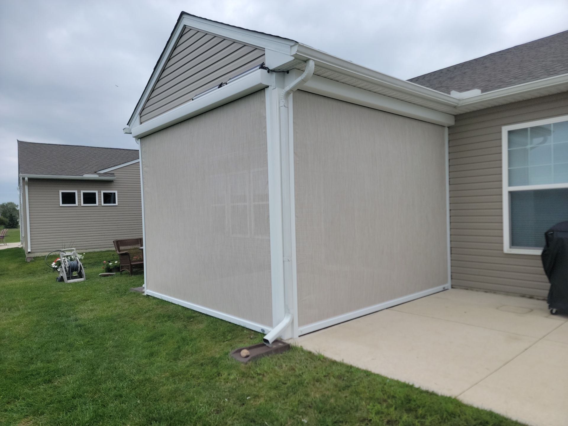 brown outside screened back porch timan and co