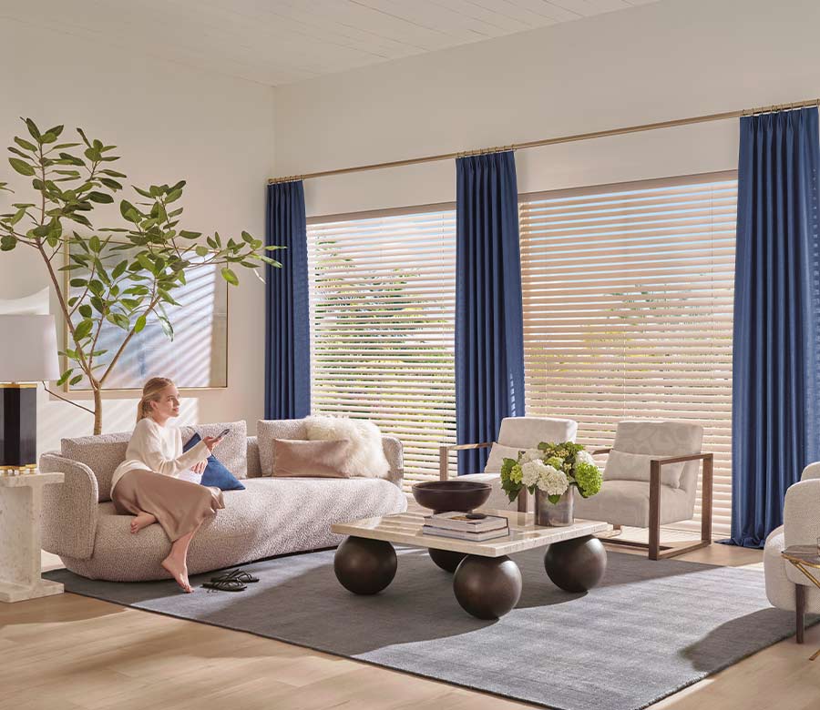 beige fabric blinds layered with floor to ceiling drapery Chagrin Falls OH