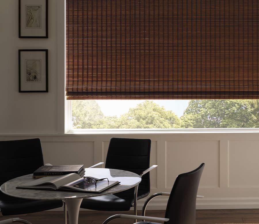 breakfast nook Bedroom with neutral woven blinds with room darkening blinds chagrin falls