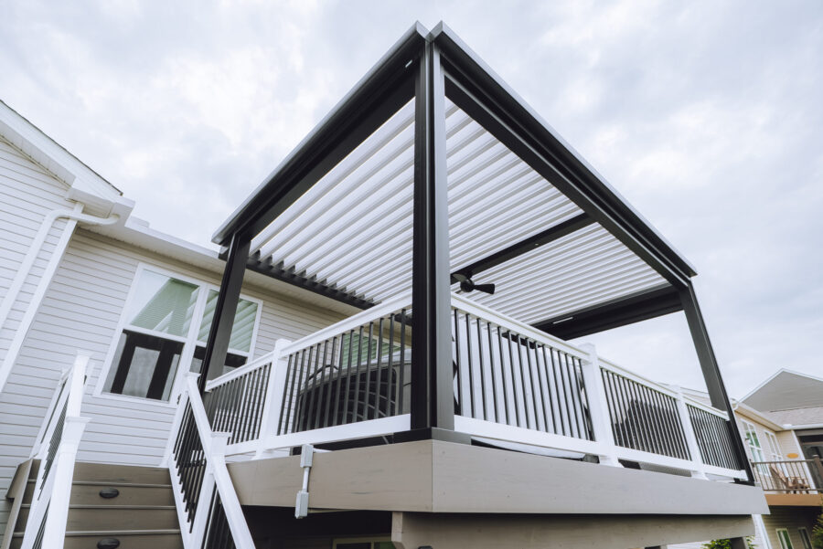 black and white color scheme for pergola and exterior shades on patio 