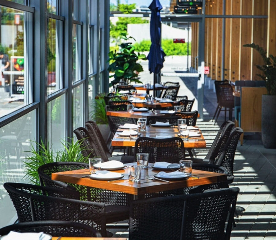 glass opening door retractable in restaurant