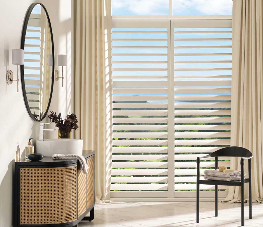 Water-resistant PolySatin™ shutters in a bathroom window