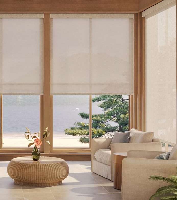 light-filtering-cream-designer-screen-shades-in-coastal-living-room-timan-and-co cream neutral colored screens in living room